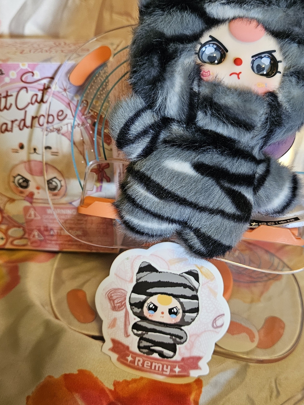 Kuwaii Remy Plush in Gray and Black Striped Cat Outfit